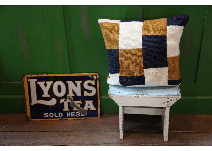 Hand knitted pure wool cushion. Harlequin 
